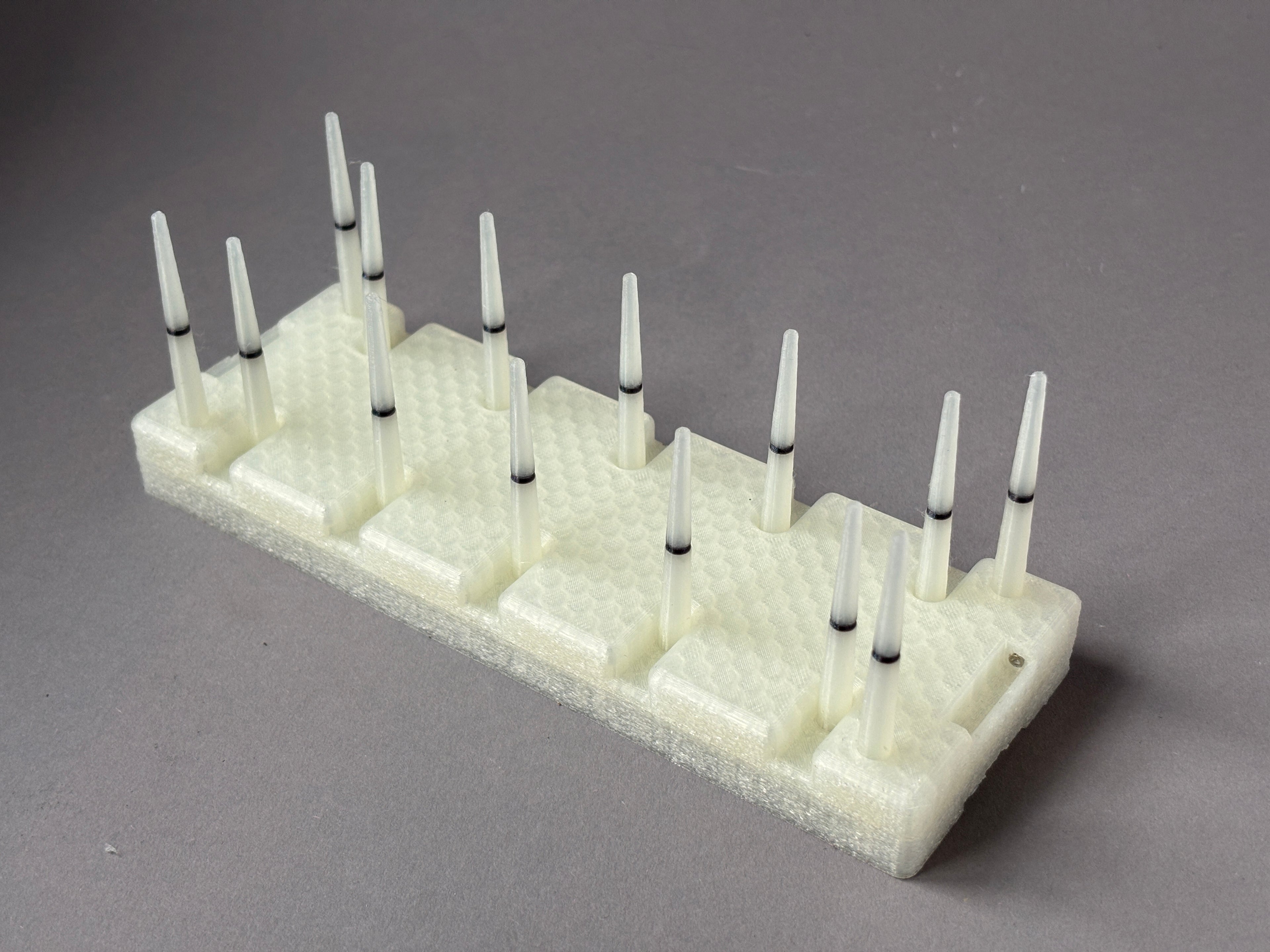 white clear transparent drying rack for bassoon reeds