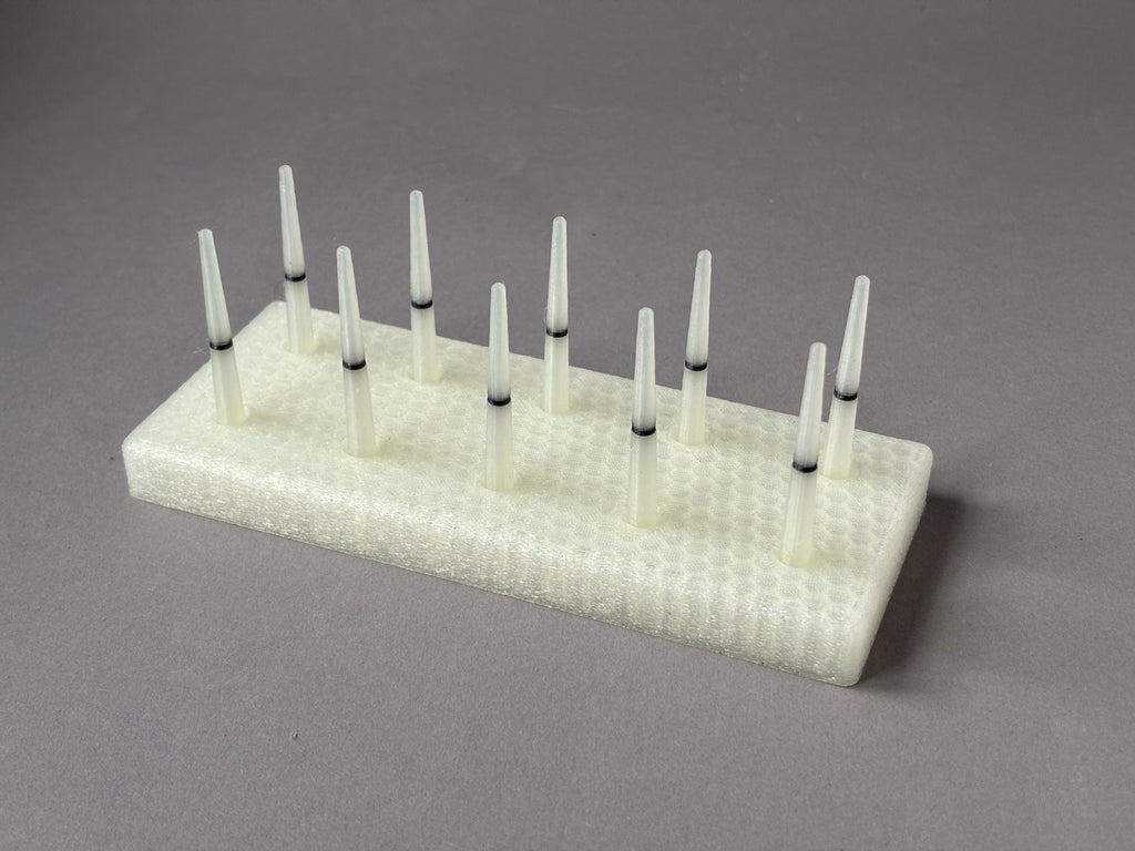 Cream FswStudio bassoon reed drying rack with ten removable Dorn-style pins