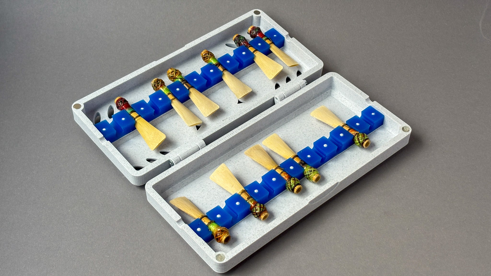 white case with 20 bassoon reeds
