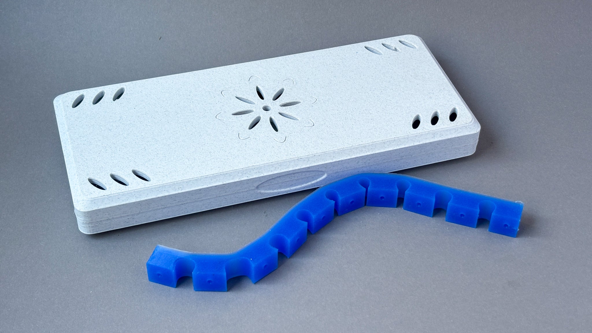 white contrabassoon case with blue silicon strap band holder