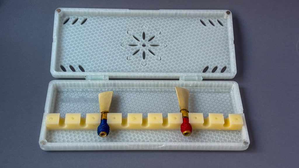 contrabassoon clear with reeds reed case