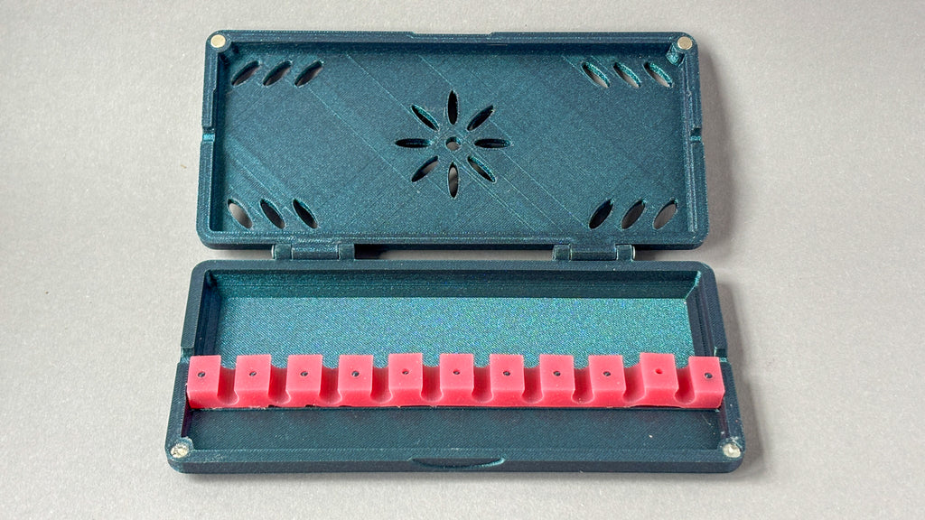 open bassoon reed case with installed silicon band holder