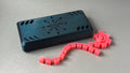 black blue bassoon reed case for 20 reeds with red band holder